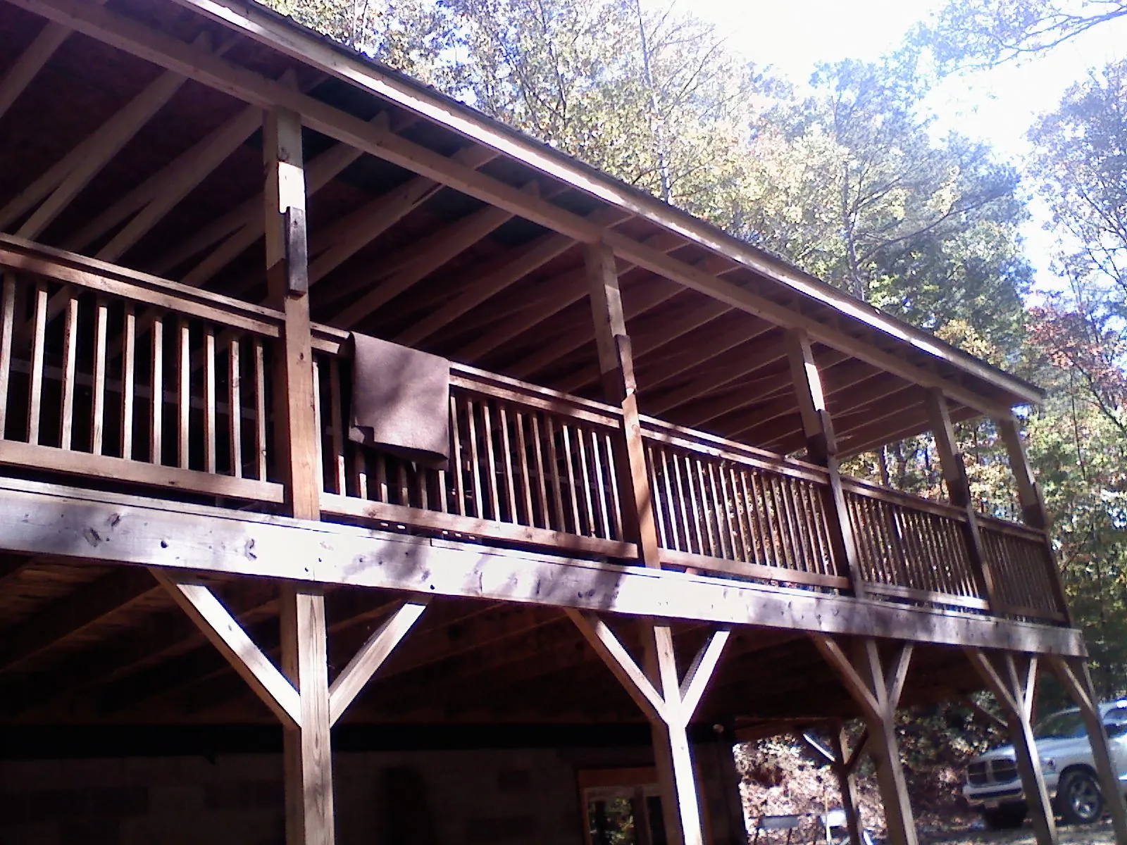 Timber framing under a new elevated porch and deck — Roof Leak Repair in San Fernando by Roofing Brothers